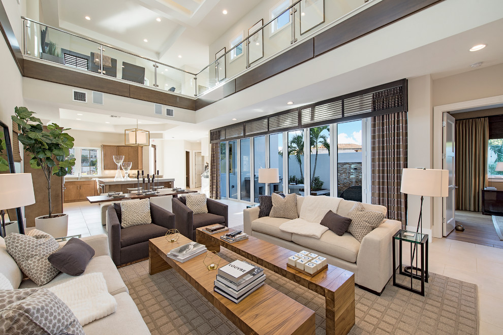 Inspiration for a contemporary formal living room in Miami with beige walls and no tv.