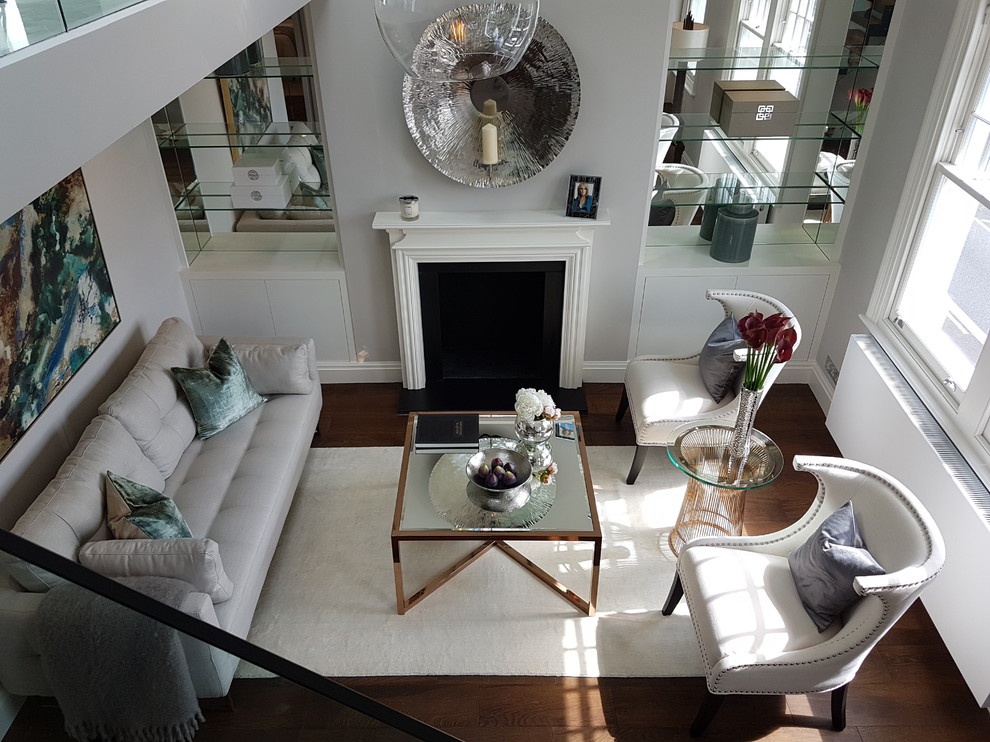 Example of a transitional living room design in London
