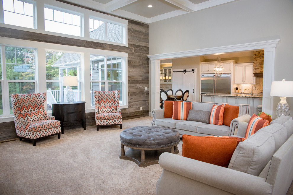 Immagine di un grande soggiorno tradizionale aperto con sala formale, pareti grigie, moquette e pavimento marrone