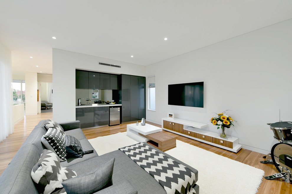 Design ideas for a contemporary living room in Perth with white walls and a wall mounted tv.