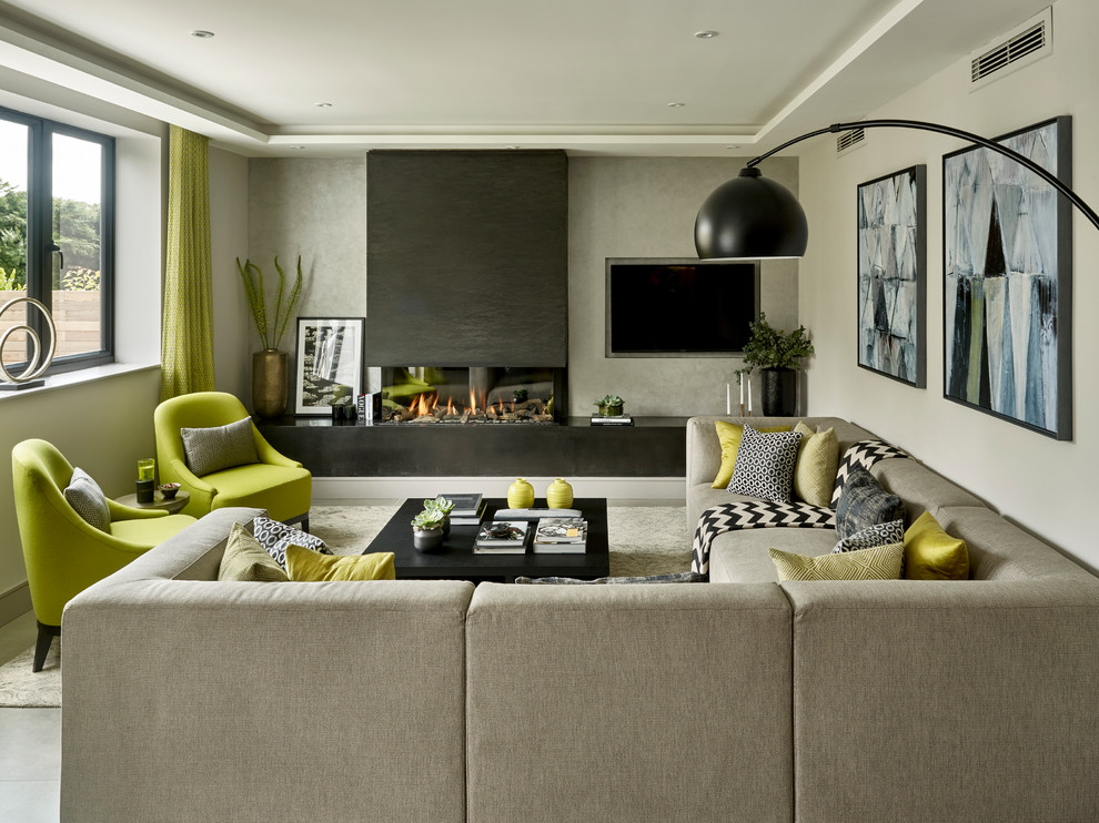 Trendy living room photo in Other with gray walls, a ribbon fireplace and a wall-mounted tv