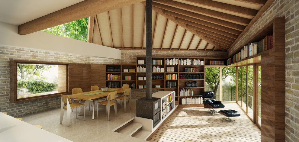 Inspiration för ett funkis allrum med öppen planlösning, med ett bibliotek och en öppen vedspis