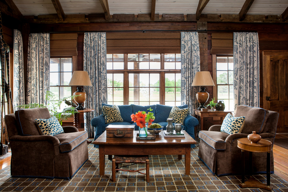 Immagine di un soggiorno country con sala formale e tappeto