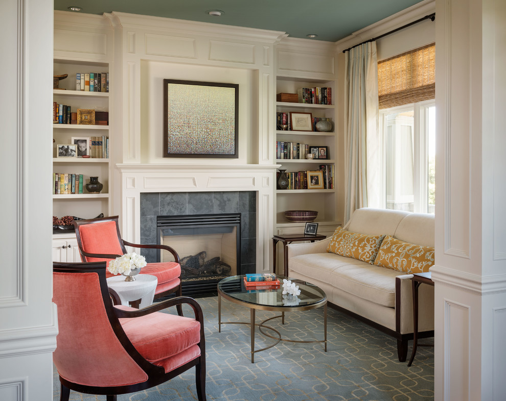 Example of a small classic living room library design in Seattle with a standard fireplace