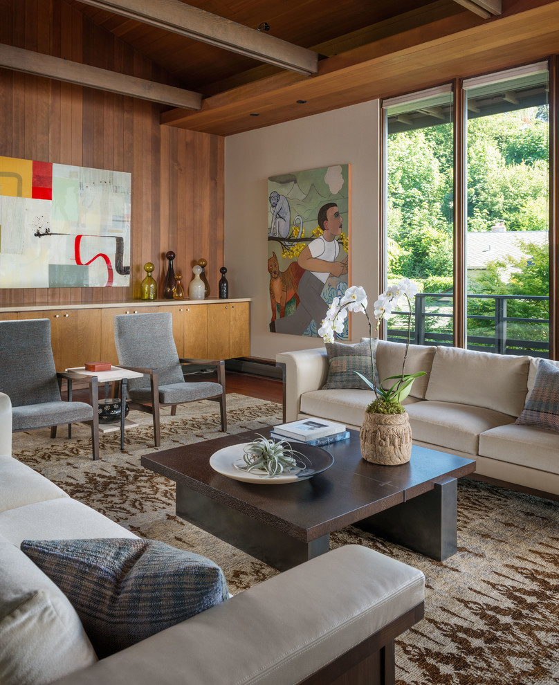 Example of a large trendy living room design in Seattle with beige walls