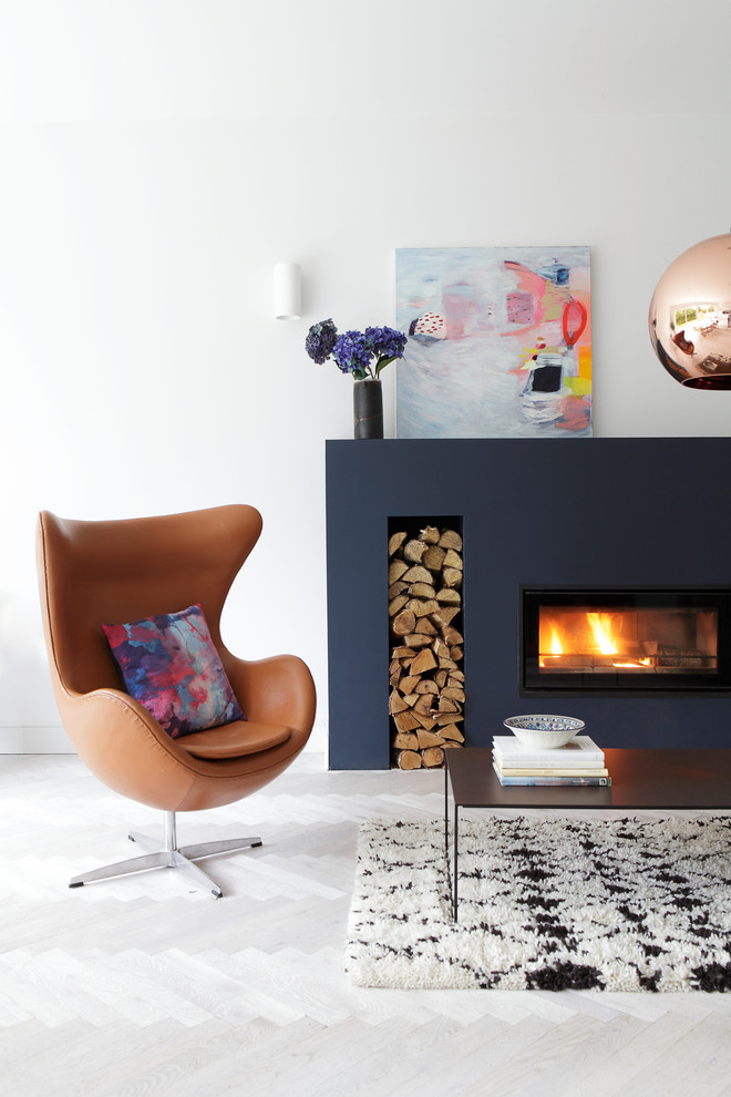 Inspiration for a contemporary formal enclosed living room in Dublin with white walls, carpet and a ribbon fireplace.
