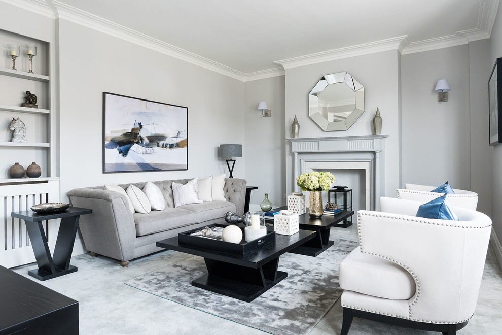 Inspiration for a medium sized classic formal living room in London with grey walls, carpet, a standard fireplace and grey floors.