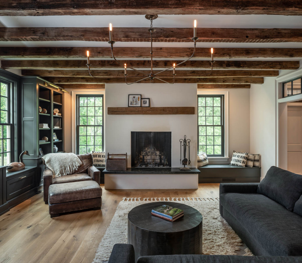 Example of a large cottage formal light wood floor and beige floor living room design in Philadelphia with white walls