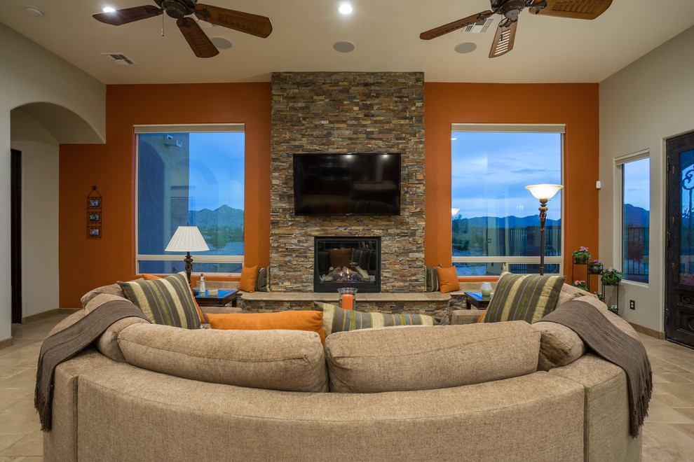 На фото: большая открытая гостиная комната в стиле модернизм с оранжевыми стенами, полом из керамической плитки, стандартным камином, фасадом камина из камня и телевизором на стене с
