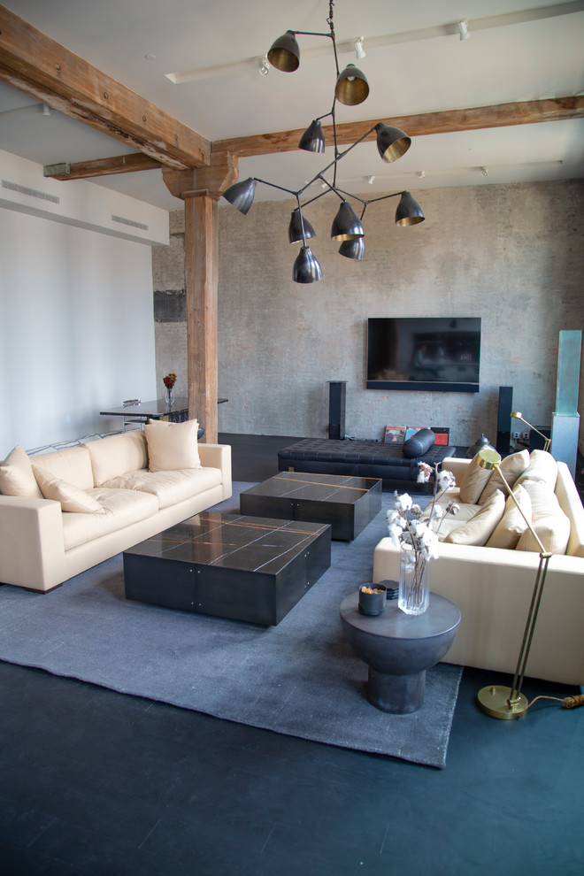 Ispirazione per un soggiorno minimal con pareti grigie, TV a parete e pavimento nero
