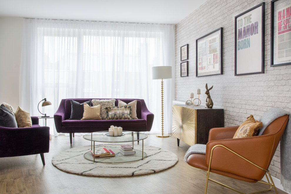 This is an example of a contemporary formal and grey and purple living room in London with medium hardwood flooring, no fireplace and wallpapered walls.