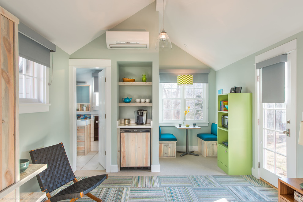 Inspiration for a transitional living room remodel in Denver with blue walls