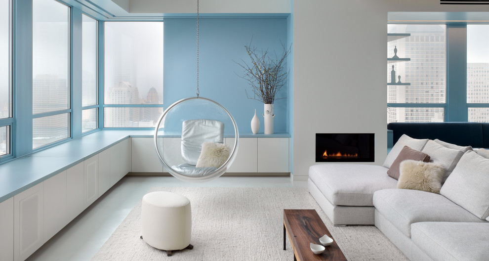 Living room - contemporary open concept and formal living room idea in San Francisco with blue walls and a ribbon fireplace