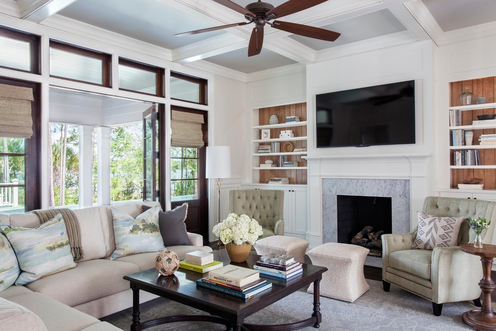 Example of a mid-sized transitional open concept living room design in Charleston with beige walls, a standard fireplace, a stone fireplace and a wall-mounted tv