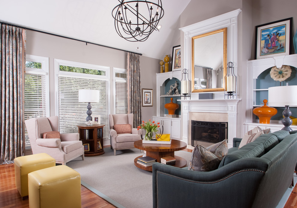 Large elegant formal medium tone wood floor living room photo in Atlanta with beige walls and a standard fireplace