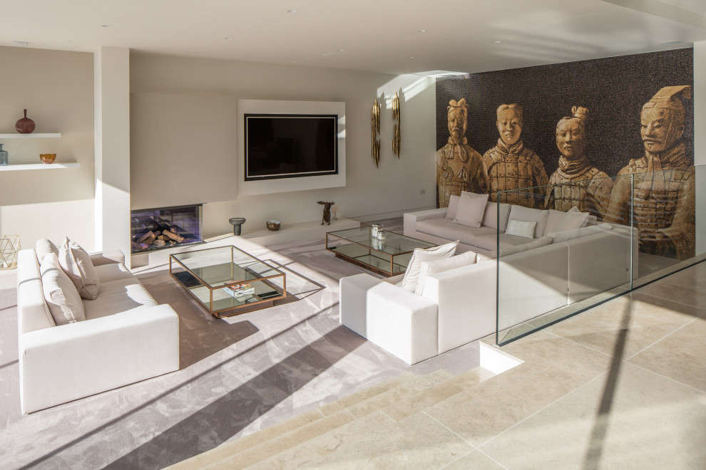 Идея дизайна: гостиная комната в стиле модернизм с белыми стенами и телевизором на стене