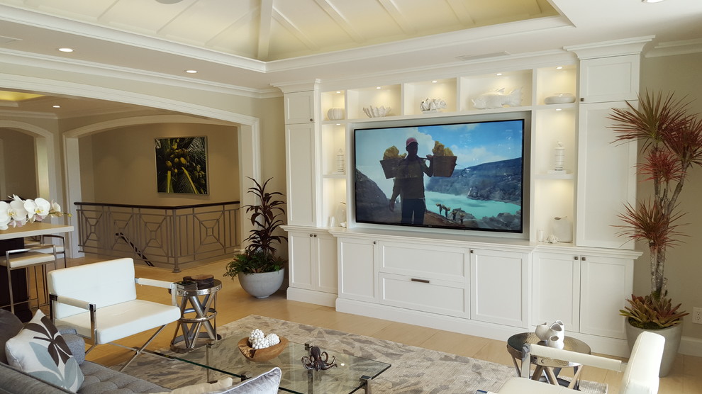 This is an example of a medium sized world-inspired open plan living room in Other with beige walls, porcelain flooring, no fireplace and a built-in media unit.