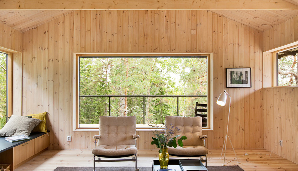 Foto på ett minimalistiskt vardagsrum