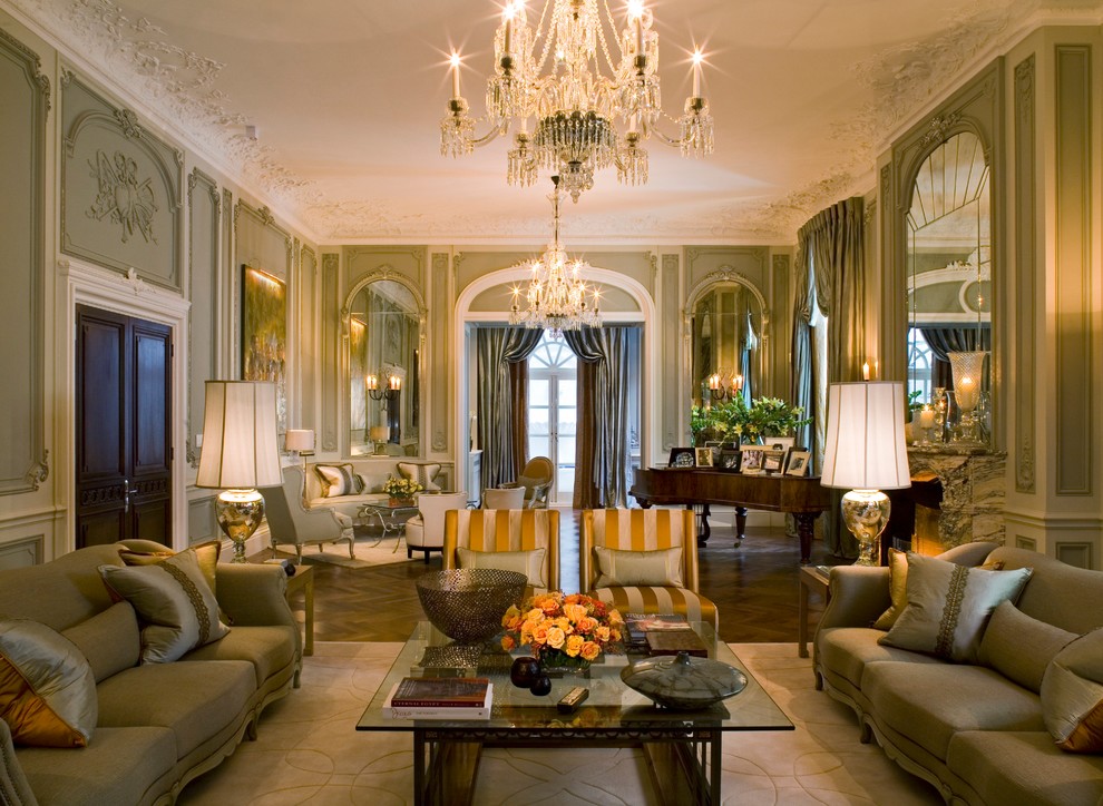 Classic formal open plan living room in London with beige walls, dark hardwood flooring and no tv.
