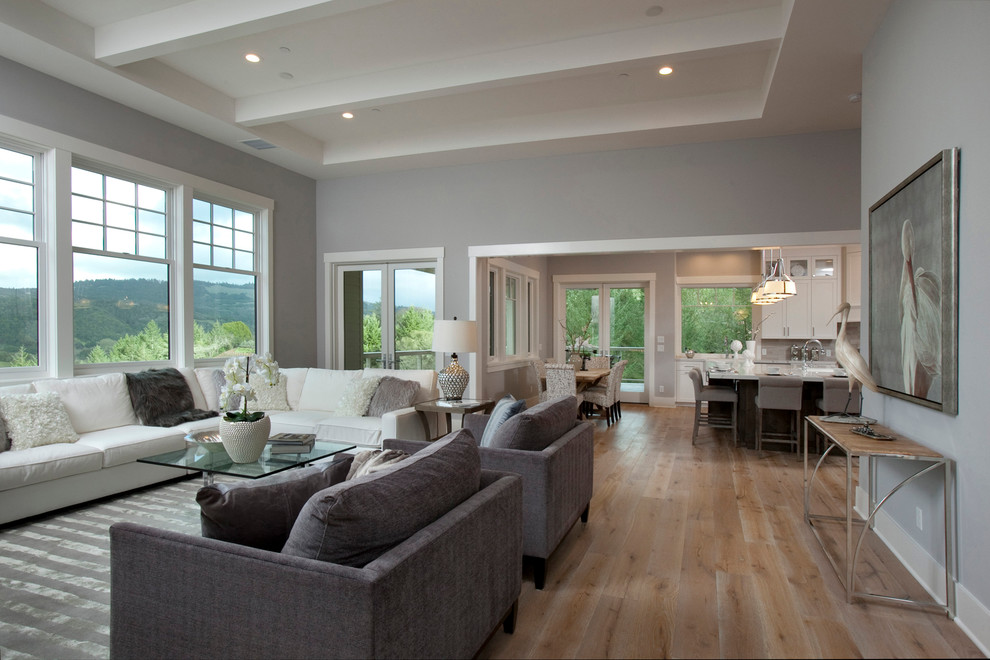 Inspiration for a large transitional formal and open concept light wood floor living room remodel in San Francisco with gray walls, no fireplace and no tv