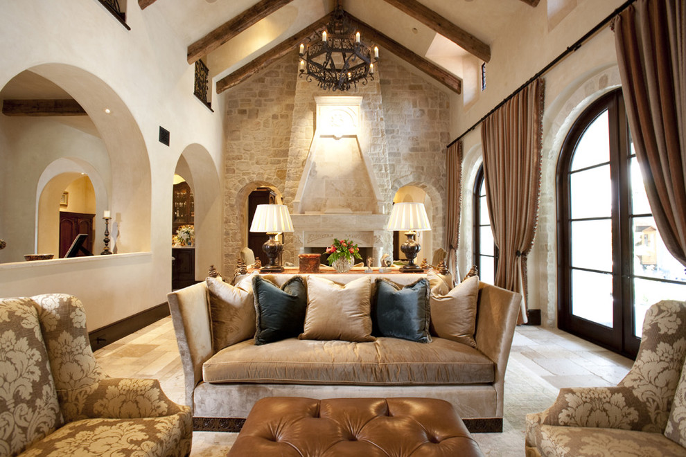 Inspiration for a mediterranean living room remodel in Houston with beige walls