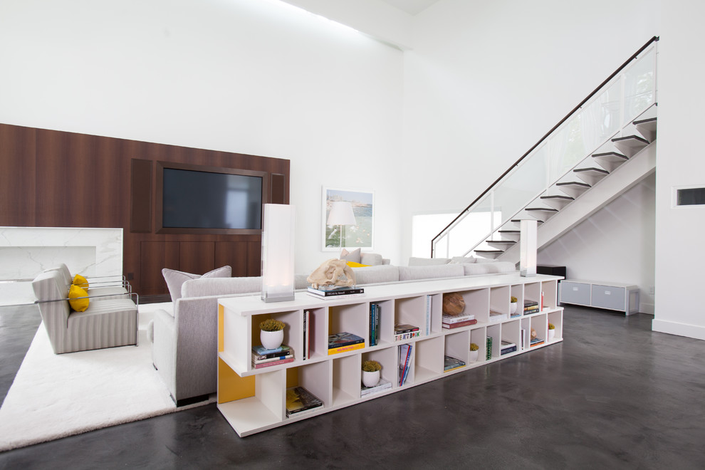 Inspiration for a contemporary concrete floor living room remodel in Houston
