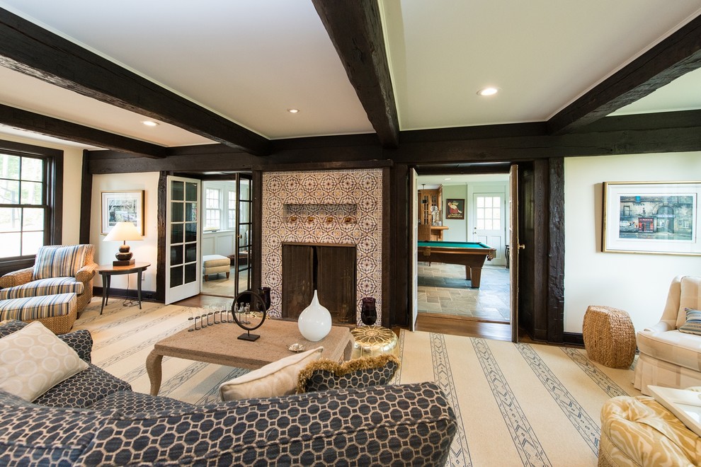 Идея дизайна: парадная, изолированная гостиная комната среднего размера в классическом стиле с бежевыми стенами, ковровым покрытием и фасадом камина из плитки без телевизора