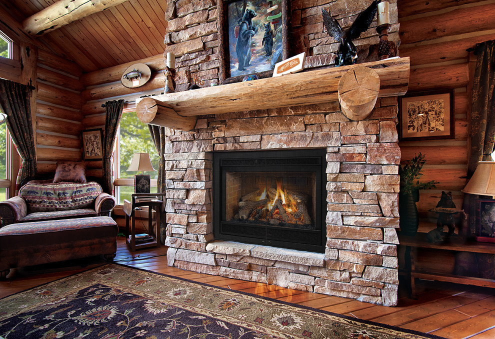 Inspiration for a large rustic formal enclosed living room in Denver with brown walls, dark hardwood flooring, a standard fireplace, a stone fireplace surround, no tv and brown floors.