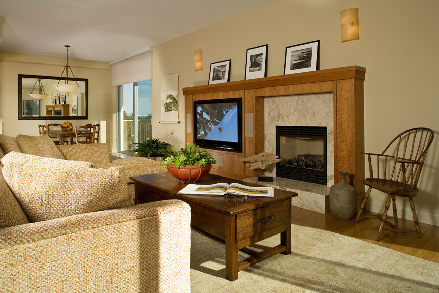 This is an example of a medium sized classic open plan living room in San Francisco with beige walls, medium hardwood flooring, a standard fireplace, a tiled fireplace surround and a built-in media unit.