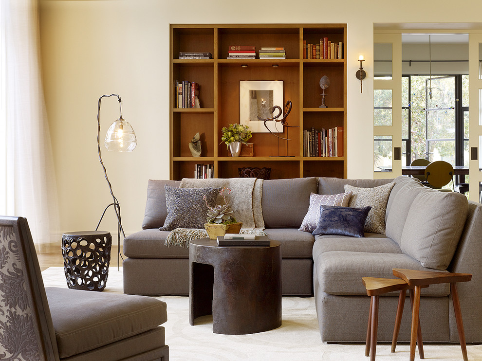 Living room - transitional enclosed living room idea in San Francisco with beige walls
