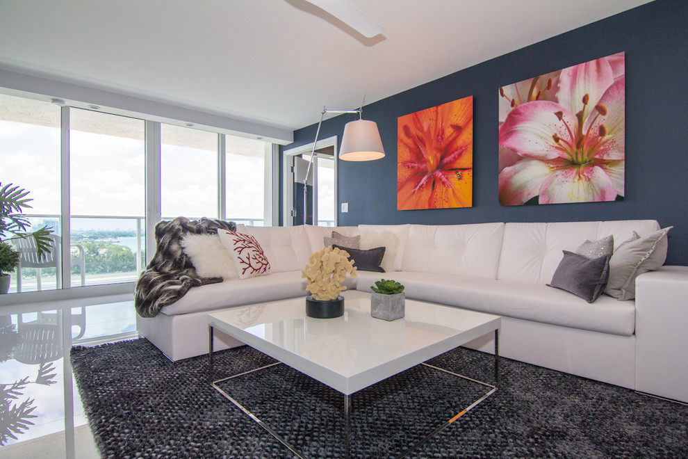 Inspiration for a contemporary living room remodel in Newark with blue walls