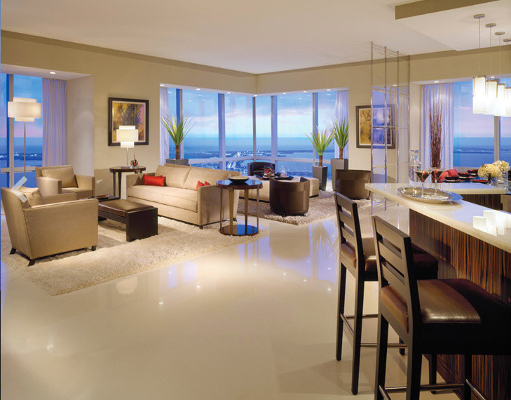 Example of a mid-sized trendy formal and open concept linoleum floor and white floor living room design in Miami with beige walls, no fireplace and no tv