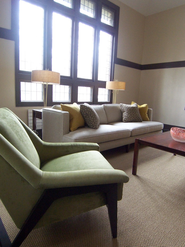 Foto di un soggiorno minimalista con pareti beige