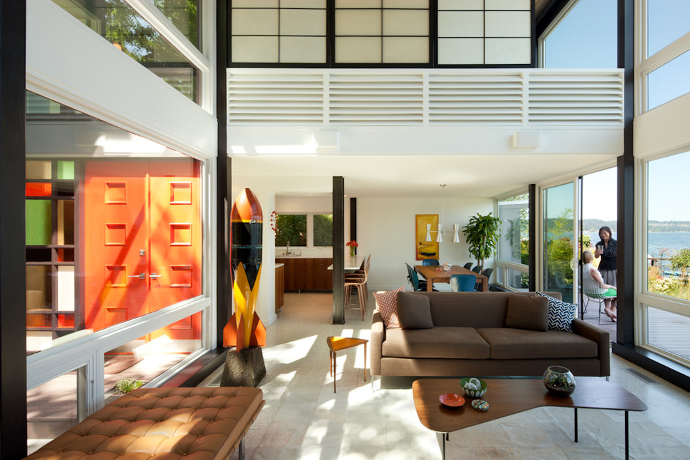 Modern open plan living room in Seattle with white walls.