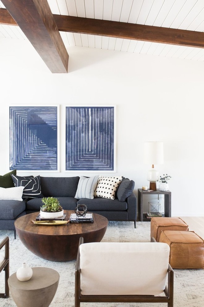 Medium sized midcentury open plan living room in Salt Lake City with white walls and medium hardwood flooring.
