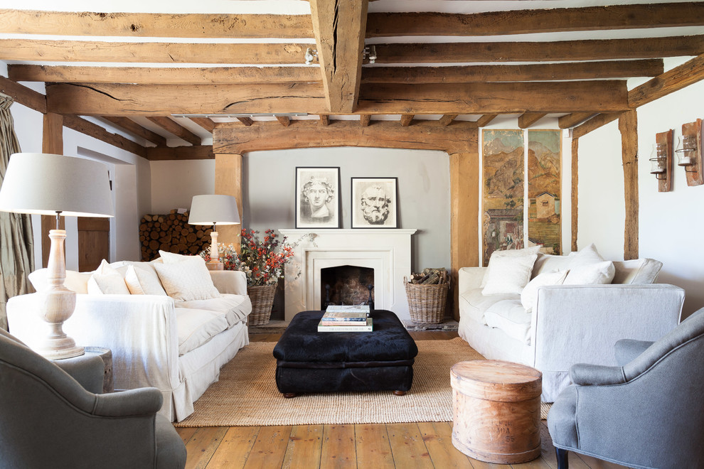 Inspiration for an enclosed living room in Gloucestershire with a standard fireplace and no tv.