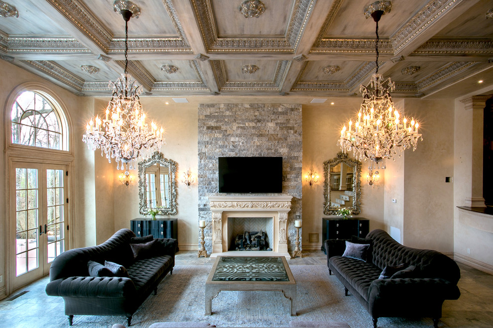 Стильный дизайн: огромная парадная гостиная комната в классическом стиле с полом из известняка, стандартным камином, телевизором на стене и серым полом - последний тренд