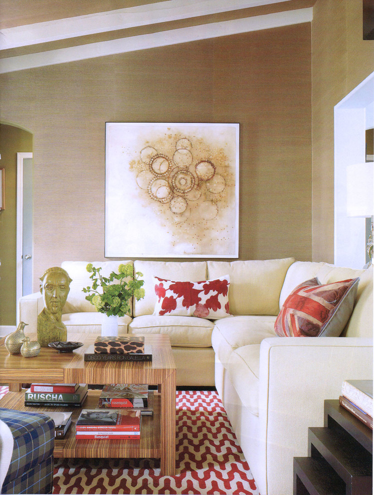 Transitional medium tone wood floor living room photo in Los Angeles with multicolored walls