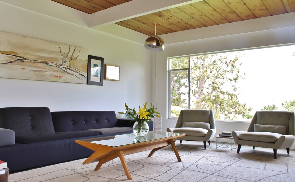 Inspiration for a midcentury living room in Los Angeles with white walls.