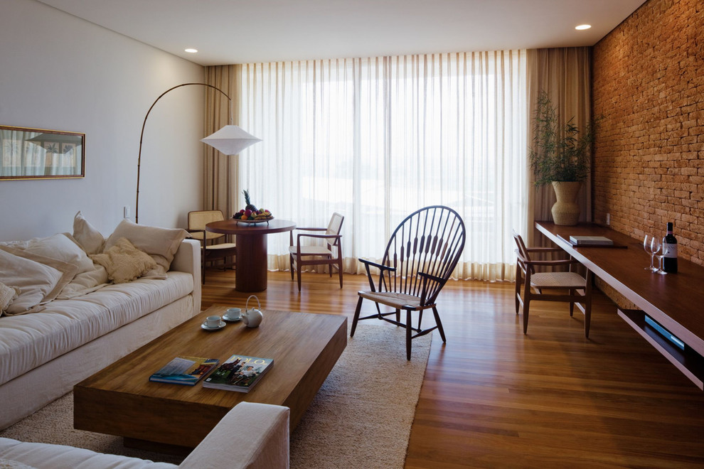 Photo of a retro living room in New York with white walls.