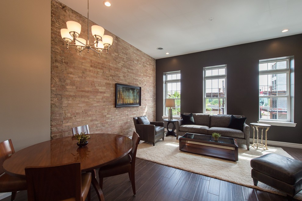 Imagen de salón abierto clásico renovado con suelo de madera en tonos medios y suelo marrón