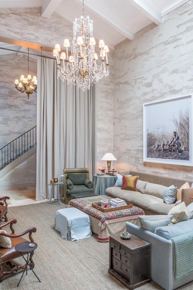 Living room - mediterranean carpeted and beige floor living room idea in New York with beige walls