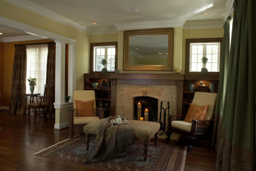 Inspiration for a large craftsman medium tone wood floor living room remodel in Atlanta with yellow walls, a standard fireplace, a tile fireplace and no tv