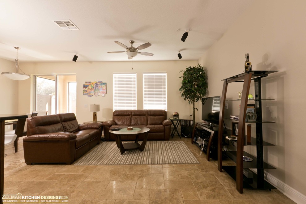 Living room - mid-sized transitional open concept travertine floor living room idea in Orlando