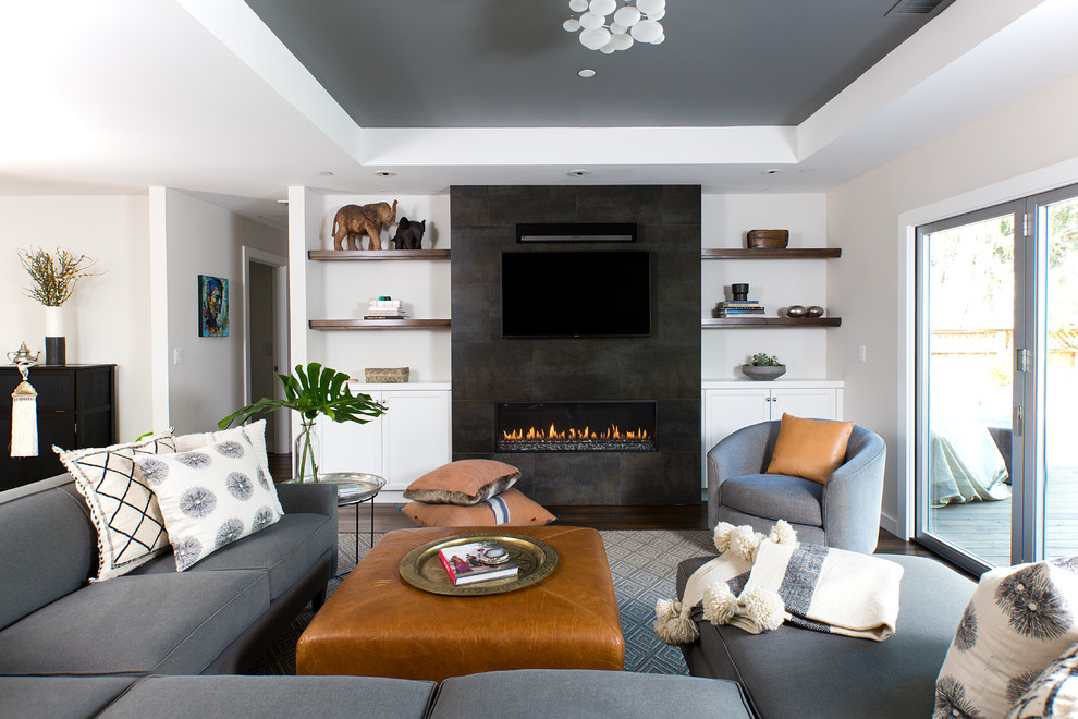 Living room - mid-sized transitional open concept dark wood floor and brown floor living room idea in San Francisco with gray walls, a ribbon fireplace, a tile fireplace and a wall-mounted tv