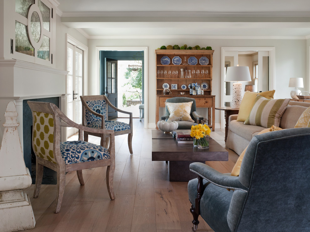 Inspiration for a timeless beige floor living room remodel in San Francisco with a concealed tv