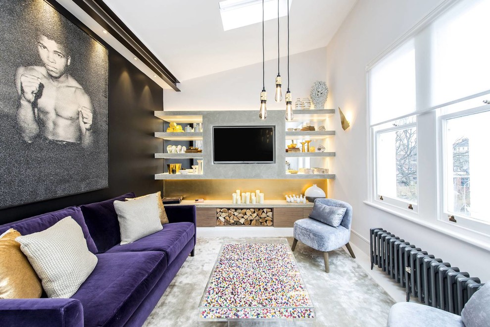 Photo of a medium sized contemporary mezzanine living room in London with white walls, a built-in media unit and white floors.