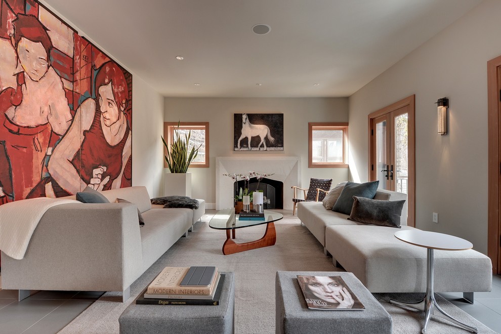 Photo of a medium sized contemporary living room in Minneapolis with grey walls, a standard fireplace and no tv.