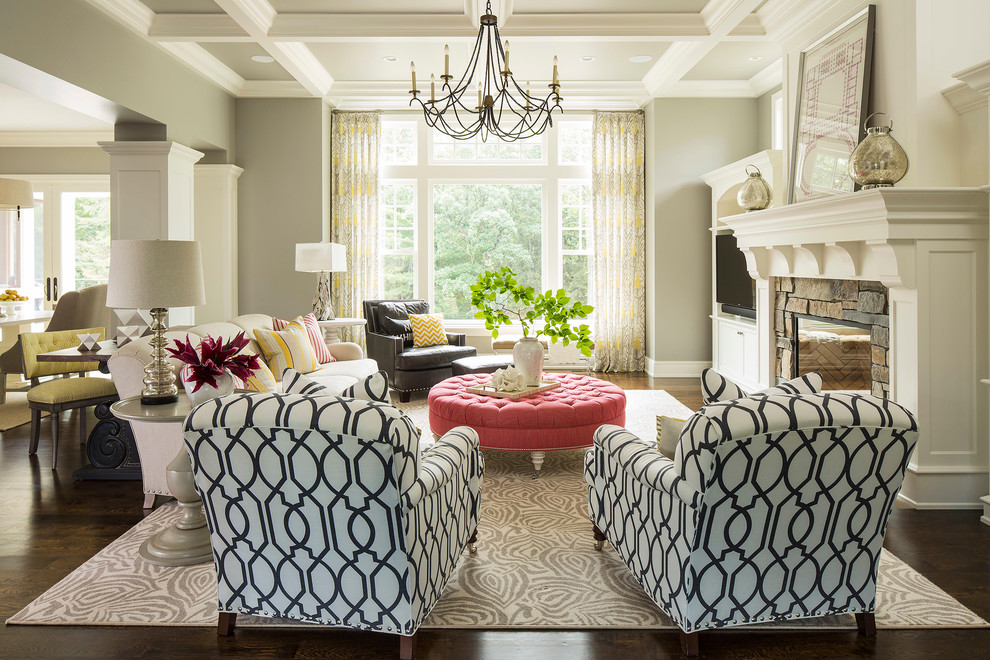 Inspiration for a transitional dark wood floor living room remodel in Minneapolis with gray walls, a stone fireplace, a standard fireplace and a media wall
