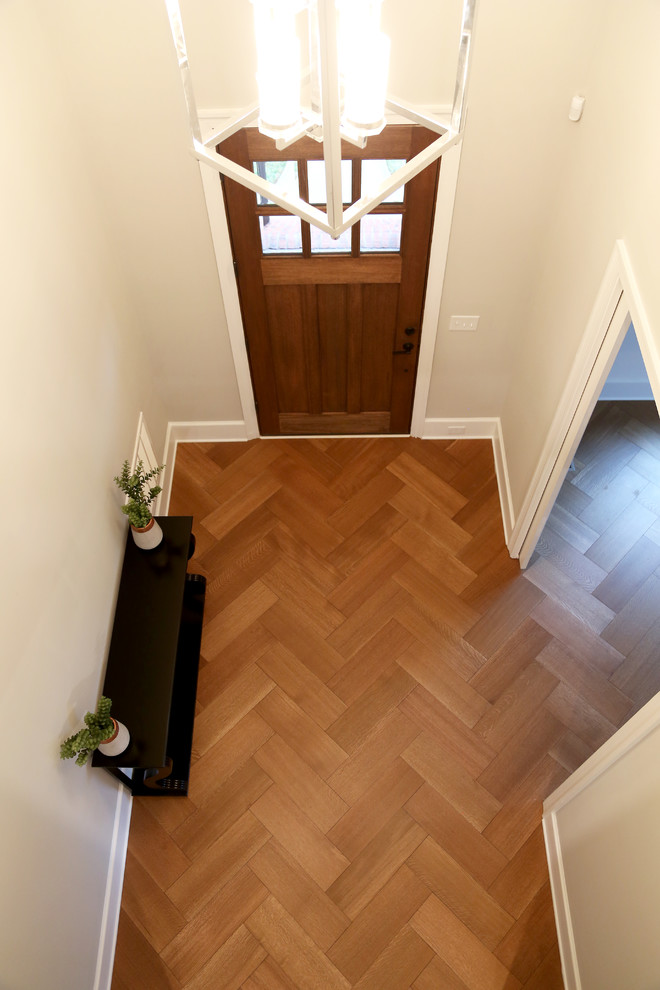 Ejemplo de salón minimalista con suelo de madera en tonos medios y suelo marrón